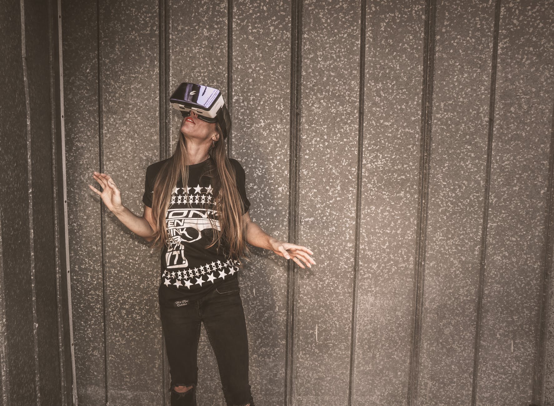 photography of a woman wearing virtual reality headset