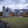 Traditional stone Guernsey new build with frameless fixed conservation rooflights for light filled living spaces