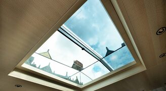 Electric sliding rooflight