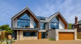 a contemporary new build home with a bespoke glazing package