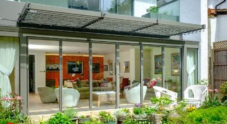 glass extension with slim framed bifolding doors