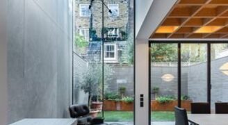 double height glass doors to rear side infill extension in London