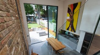 very tall sliding doors on kitchen extension