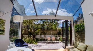 fisheye view of a glass box extension in London