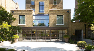 Large family home, highly glazed rear facade