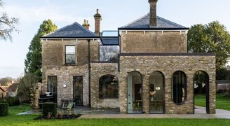 Structural arch pill windows to glazed extension of The Old Rectory in Somerset