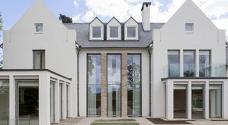 rear elevation of new build house with double height vertical sash windows