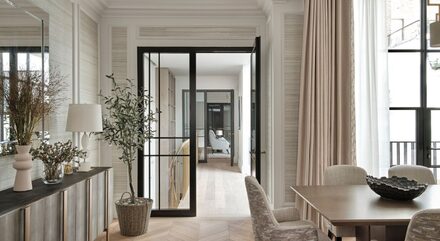 internal steel fire rated door set in London penthouse shown part open