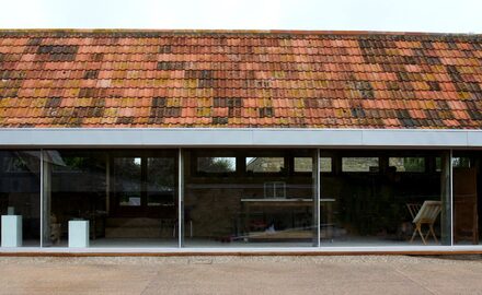 5 pane oversized sliding door in modern barn conversion