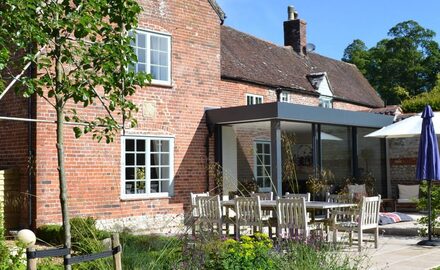 glass box extension to a grade II listed home extension