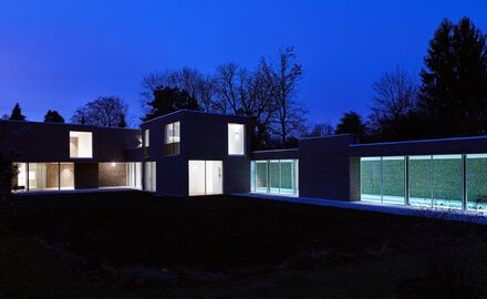 Slim sliding glass doors to luxury glazed new build home