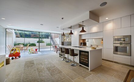 a wall of sliding glass to basement in london