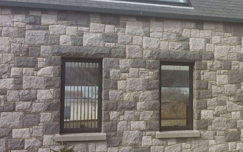 Large slim framed conservation rooflight and picture windows to new build Guernsey home