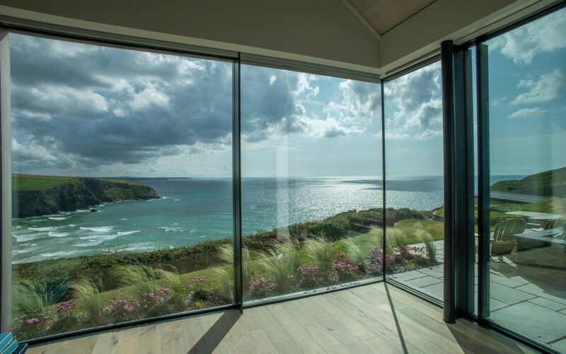 Two fixed framed sliders to the silicone corner provide uninterrupted sea views.