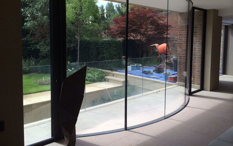 Cannon Lane curved glass balconies and slim framed doors