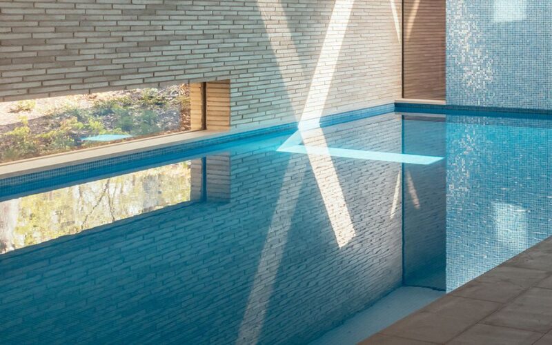 indoor swimming pool with anti condensation glass using heated glazing