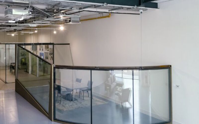 curved structural glazing showroom with curved glass wall