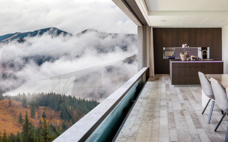 a descending window overlooking the mountains with balustrade