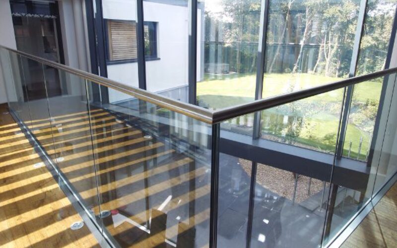 eco home design with specialist glazing including structural glazing and internal glass balustrades