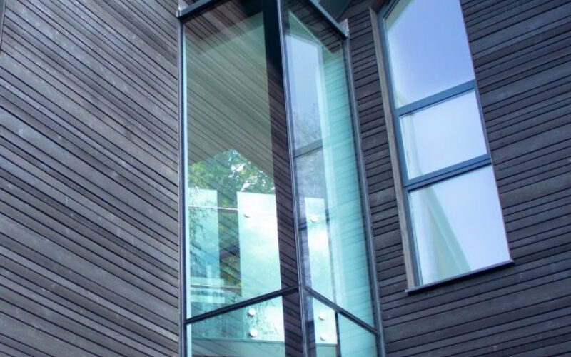 double height frameless structural glass walls