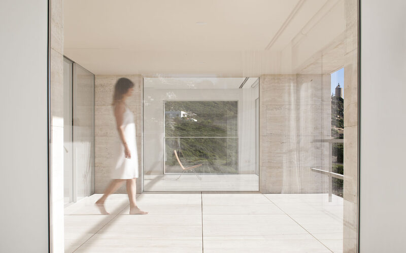 Frameless effect structural glass window to modern beach house in Spain