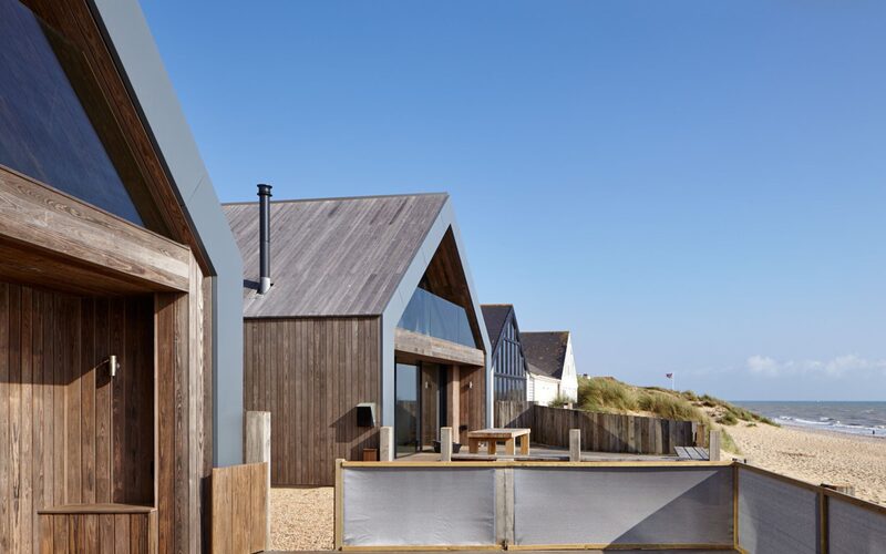 Frameless gable end structural glass in Camber Sands beach house