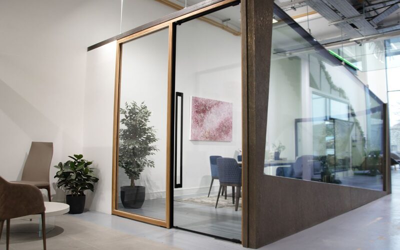 Frameless fire rated glass door in showroom