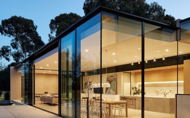 glass box structure with structural glazing and slim sliding door systems