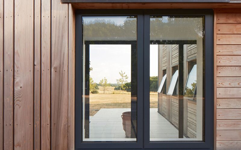 La Madonnina expansive aluminium glazing package with timber