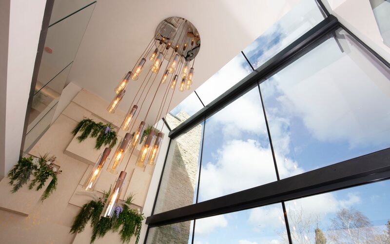 Up and over glass creating an atrium to luxury new build