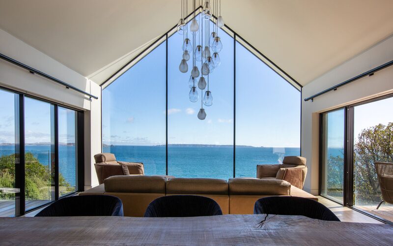 Modern Guernsey home with gable end glazing