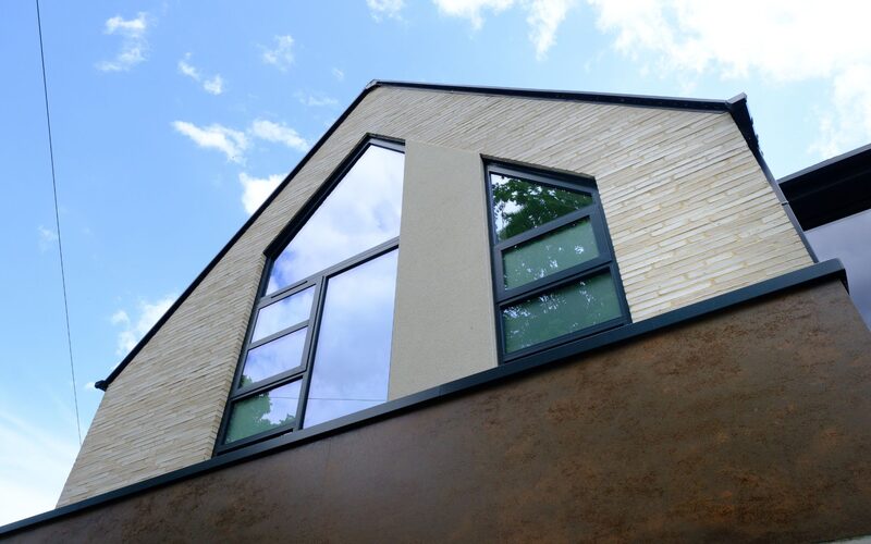 Modern house in Cambridgeshire with oversized gable end glass