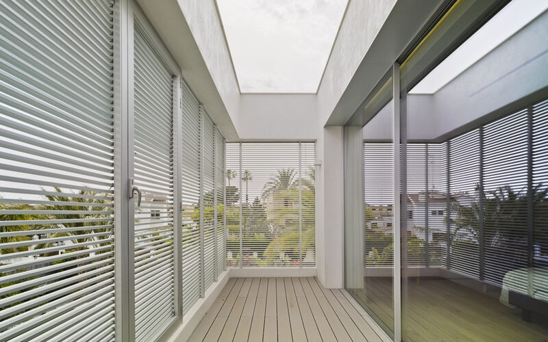 Sliding glass doors and rooflight to modern double bedrooms in a Spanish luxury villa