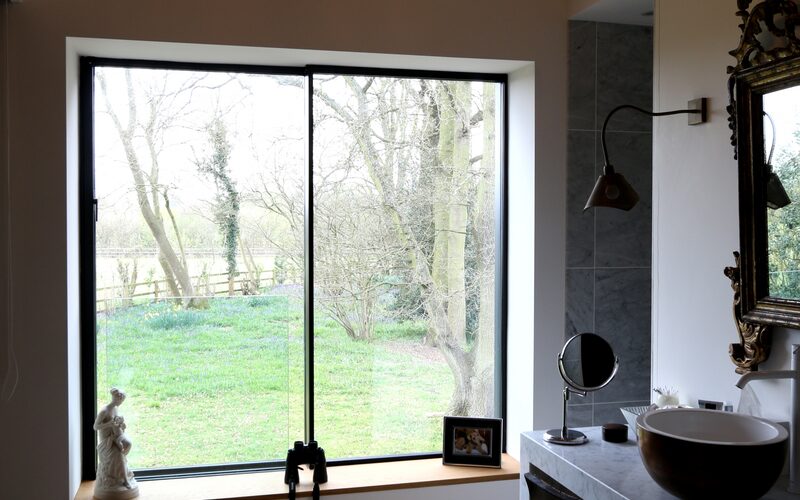 The house in the wood - slim frame sliding glass doors