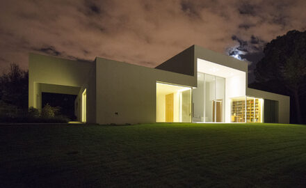 Frameless sliding glass doors and glazed glass box