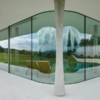 curved glass with sliding doors