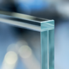 a glass balustrade with a glass capping