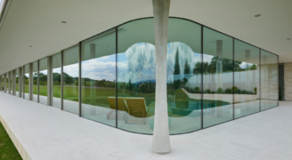 curved glass with sliding doors