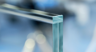 a glass balustrade with a glass capping